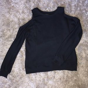 Warm black sweater with holes on shoulder